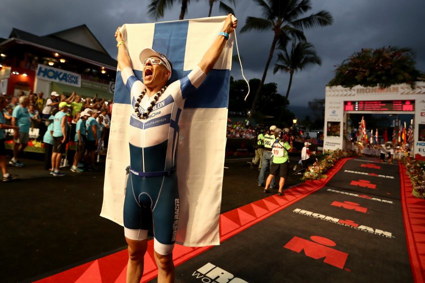 KAILUA KONA, HI - OCTOBER 08:  Alexander Stubb #1084 of Finland reacts to finishing  the 2016 IRONMAN World Championship triathlon on October 8, 2016 in Kailua Kona, Hawaii.  (Photo by Sean M. Haffey/Getty Images for Ironman)